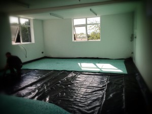Harelquin Flooring being fitted in Adel Dance Studio